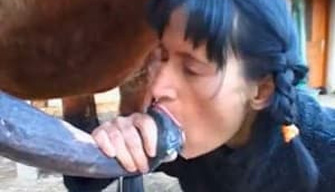 The horse finished his cum in the girls mouth